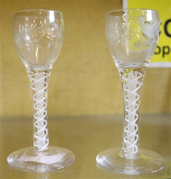 A pair of Georgian style opaque twist stem cordial glasses